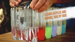 BruKon paintbrush care containers with liquids of different colours inside. The message "Cleans acrylic and enamel side by side"